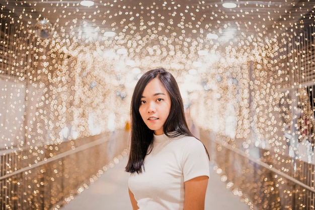 Photo asian lady teenage model look at camera with night loght decoration