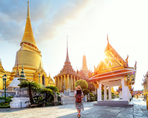 Asian lady walking and travel in Wat Phra Kaew