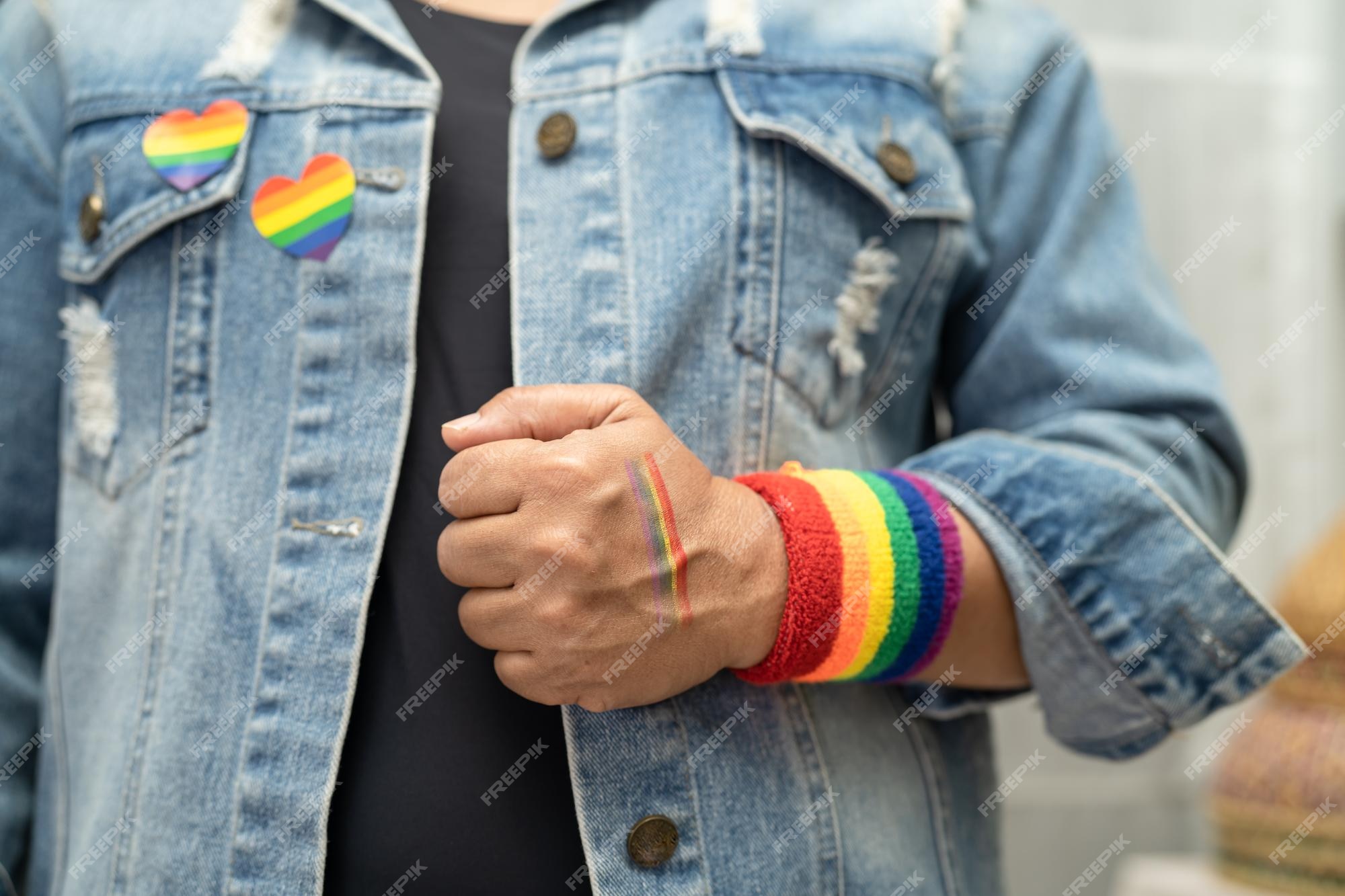 Premium Photo  Asian lady wearing rainbow flag wristbands symbol of lgbt  pride month celebrate annual in june social of gay lesbian bisexual  transgender human rights