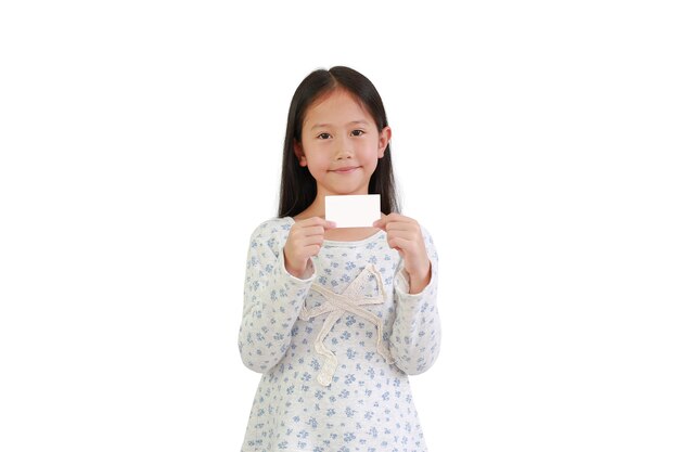 Asian little child girl holding white card isolated on white background