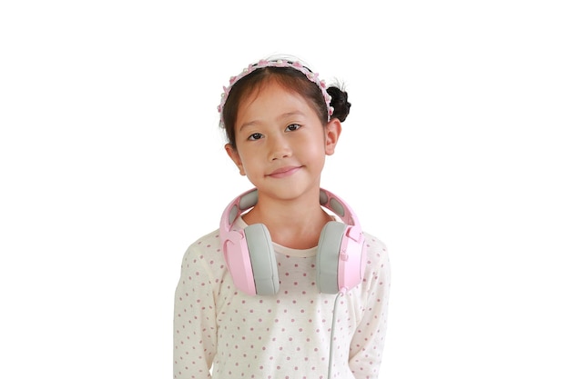 Asian little girl child with headphones on neck isolated on white background