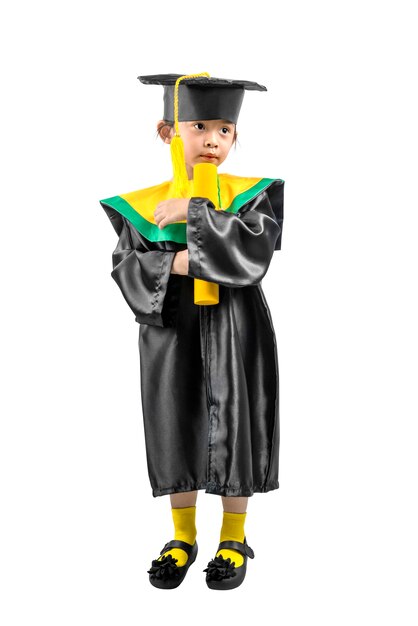 Asian little girl in hat and graduation gown holding certificate