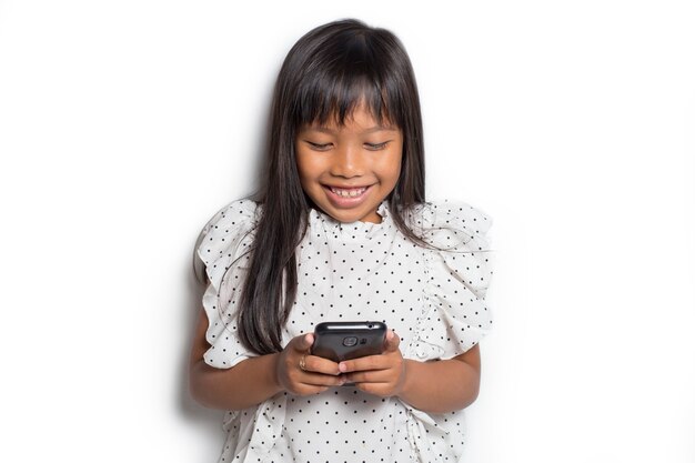 Asian little girl with a smartphone