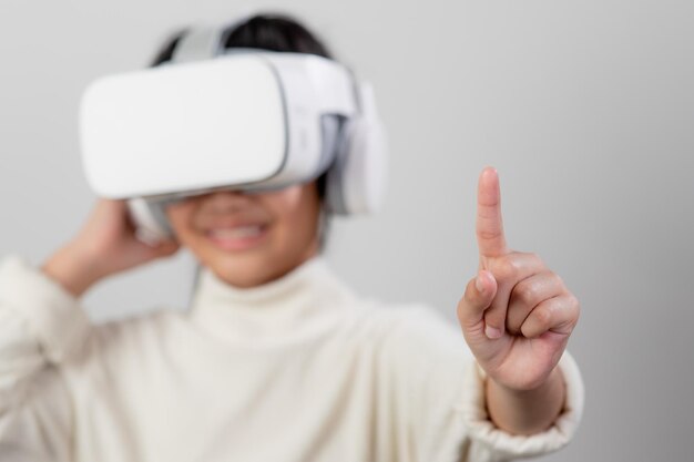 Asian little girl with virtual reality headset Innovation technology and education concept