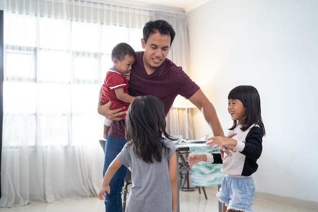 Asian little kids, sister fighting over a toy