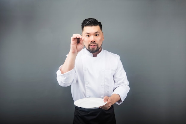 An Asian male chef 