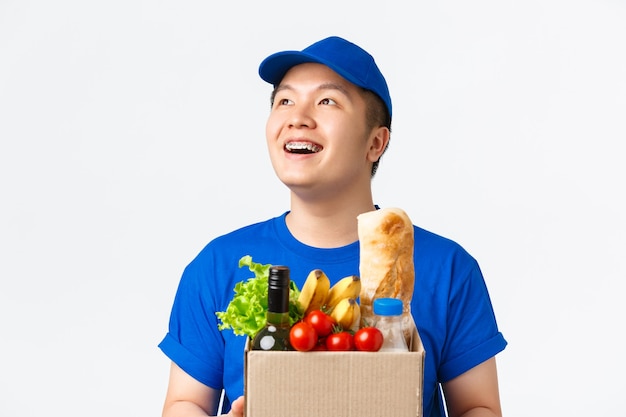 Asian male courier in blue uniform