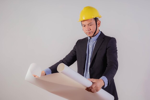 Photo asian male engineer on white background