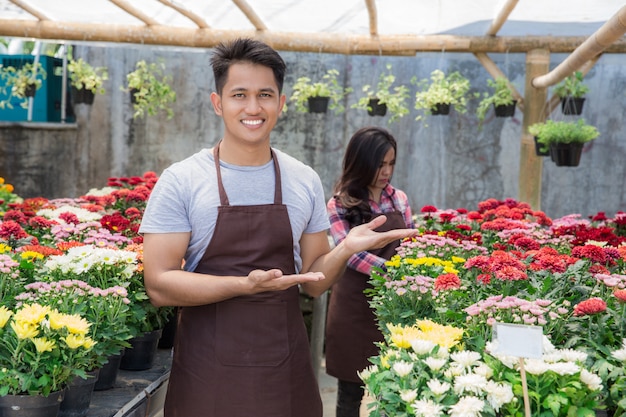 Asian male and female florist
