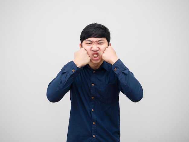 Asian man angry himself punch his face portrait white background