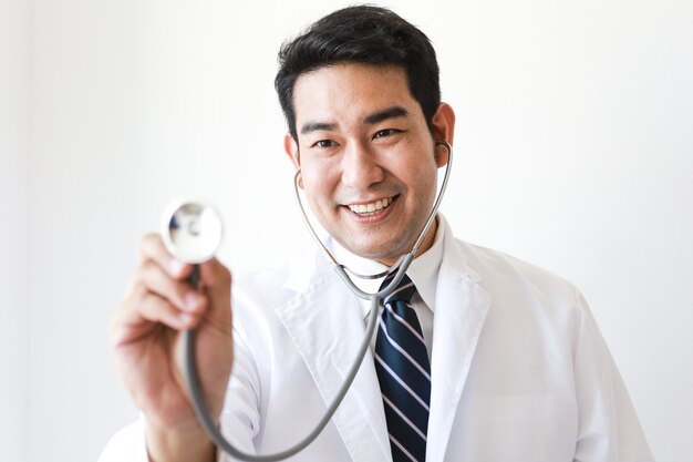 Asian man in Doctor uniform with stethoscope