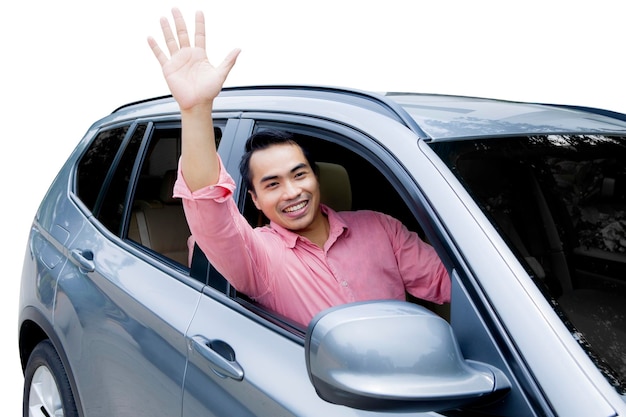 Photo asian man driving a new car