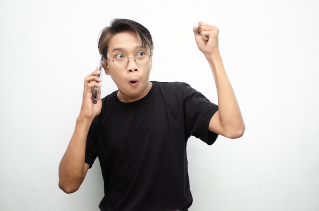 asian man holding and showing phone