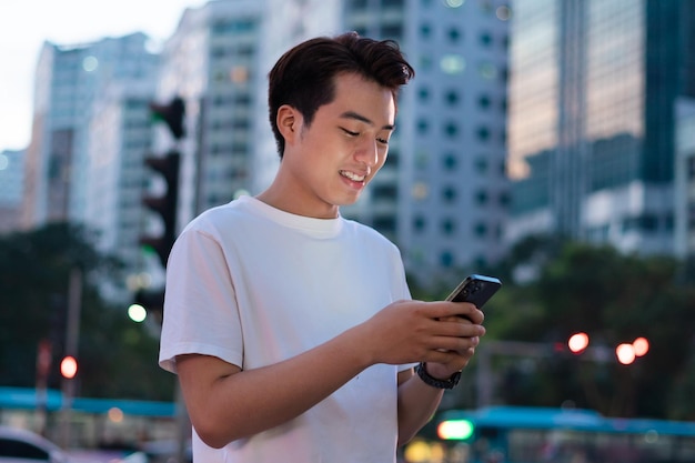 asian man portrait in the street at night