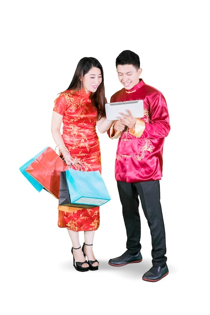 Asian man promoting some offerings to the woman