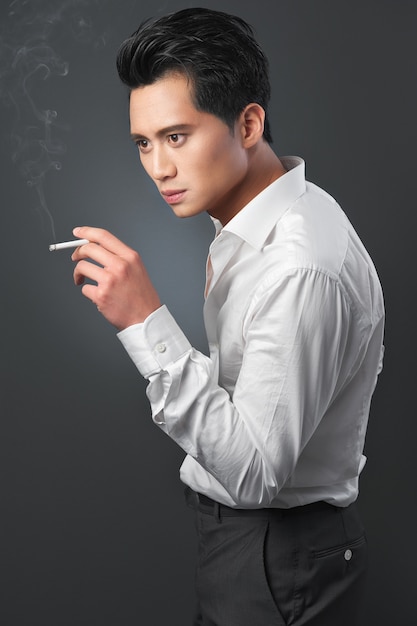 Asian Man Smoking