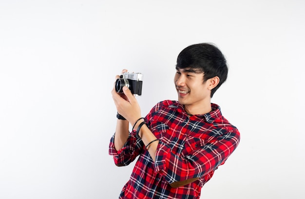 Asian man taking photo isolated on white