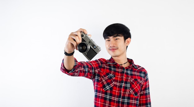 Asian man taking photo isolated on white