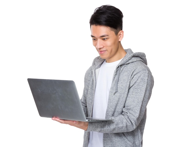 Asian man use of laptop computer