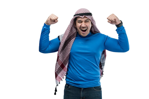 Asian man with keffiyeh standing with excited expression