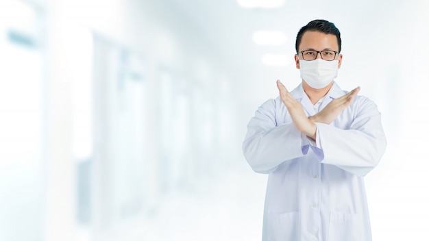 Asian medical doctor wearing a protective mask