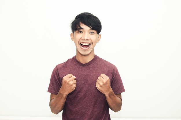 Asian men smile in casual shirts with a cheerful and enthusiastic expression