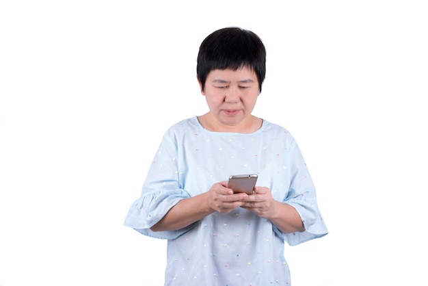 Asian Middle-aged woman using mobile phone isolated on white background