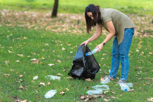 Asian mother and daughter help garbage collection charity environment