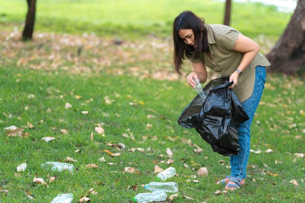 Asian mother and daughter help garbage collection charity environment