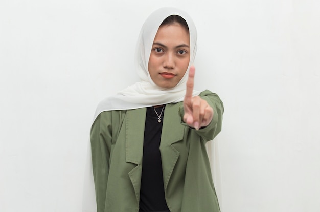 Asian muslim hijab woman show stop hands gesture