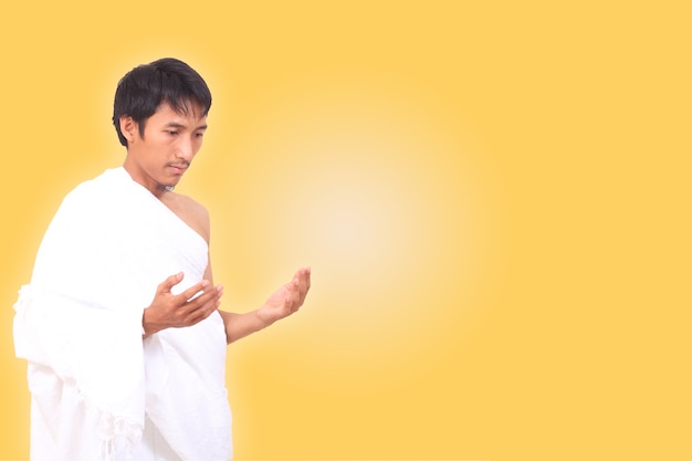 Asian muslim man wearing ihram clothes