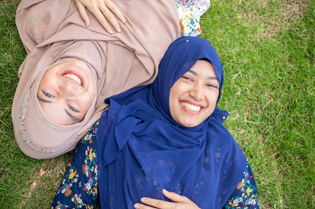 Asian muslim woman portrait in the outside.