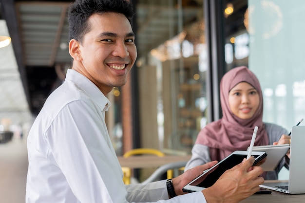 asian muslim young students studying together