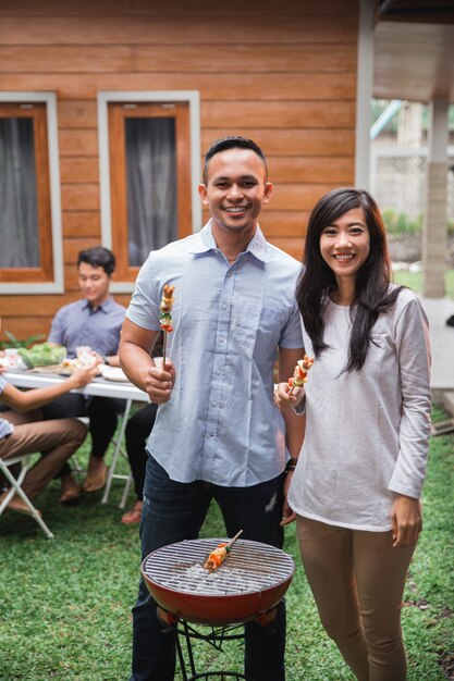 Asian people barbecue with friends