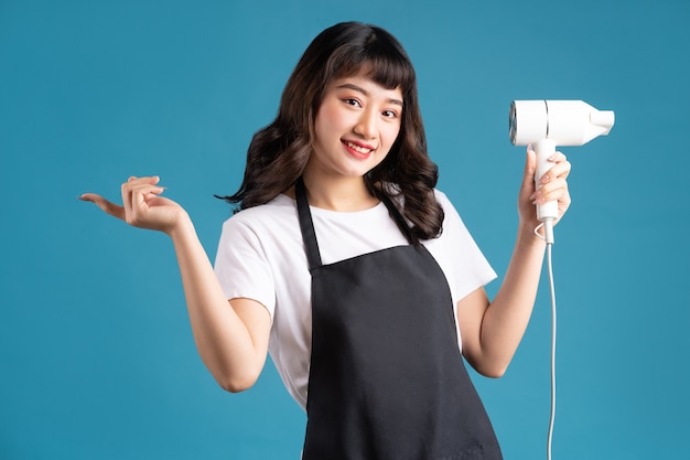 Asian portrait of female hairdresser