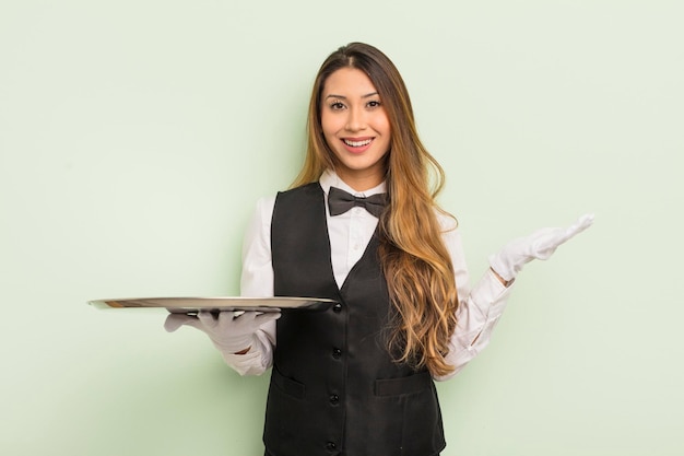 Asian pretty woman feeling happy, surprised realizing a solution or idea. waiter and tray concept