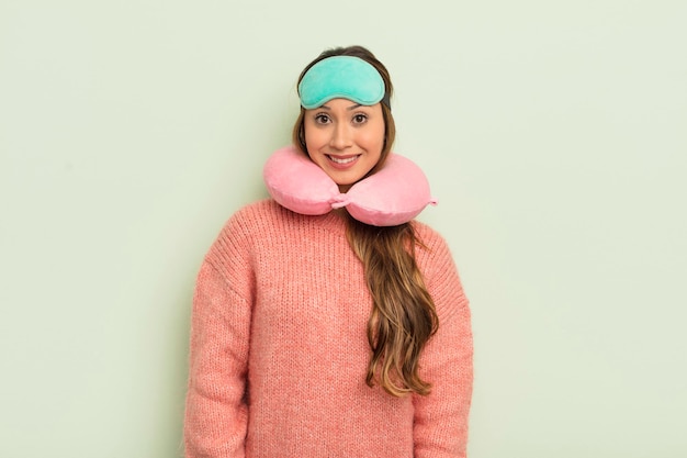 Asian pretty woman looking happy and pleasantly surprised plane passenger concept