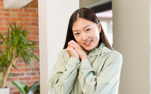 Asian pretty woman at new home interior