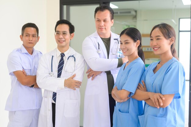 Photo an asian professional confidence medic team are walking in hospital health care concept