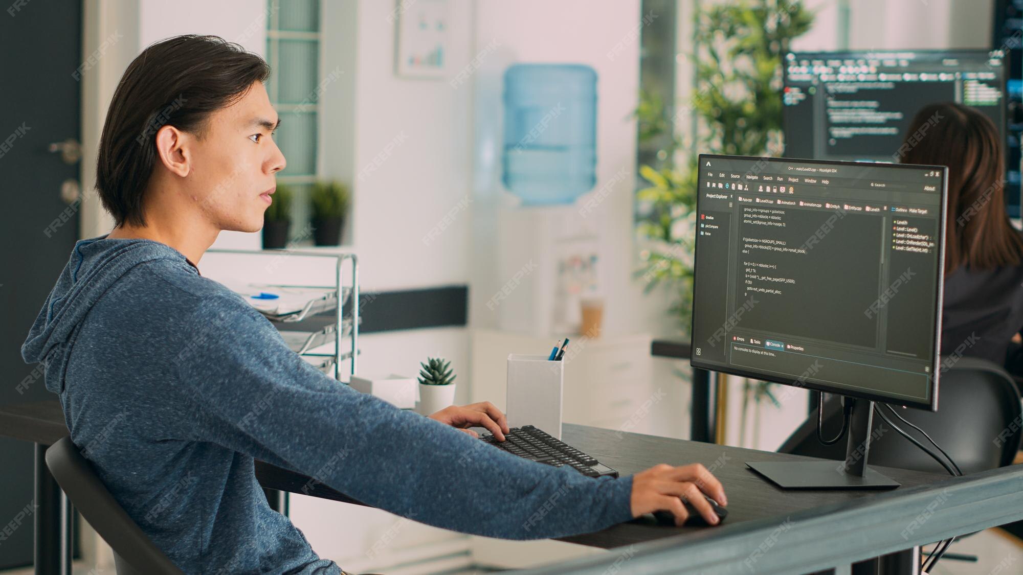 Premium Photo | Asian programer developing database interface and ...