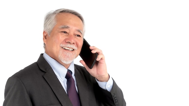 Asian senior businessman old man using a smart phone smiling feel happy isolated on white background concept for senior business success