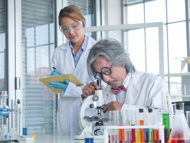 Asian Senior Medical Research Scientist working in lap