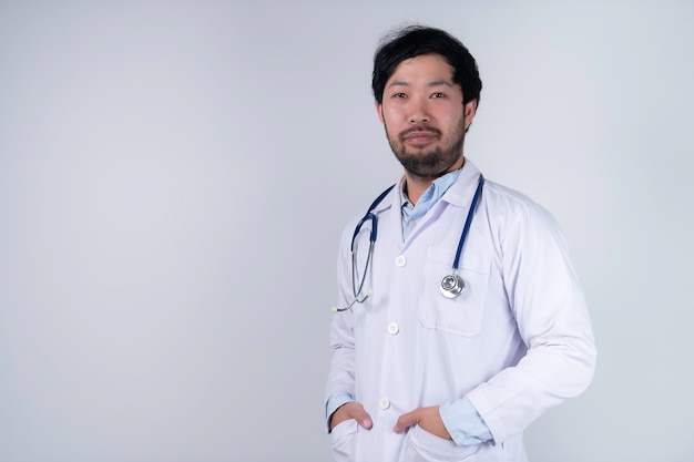 Asian smart doctor on white background