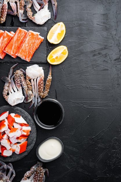 Asian snack surimi set, on black background, top view flat lay , with copyspace  and space for text