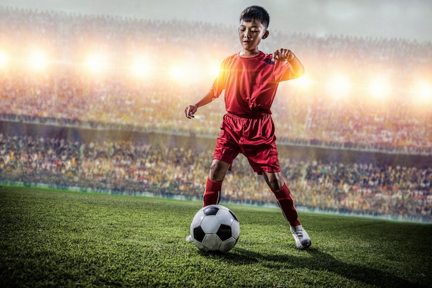 Asian soccer kids action in the stadium during match