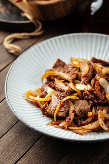 Asian spicy roast meat with onion