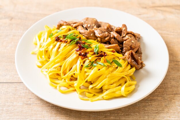 Asian stir-fried noodle with pork