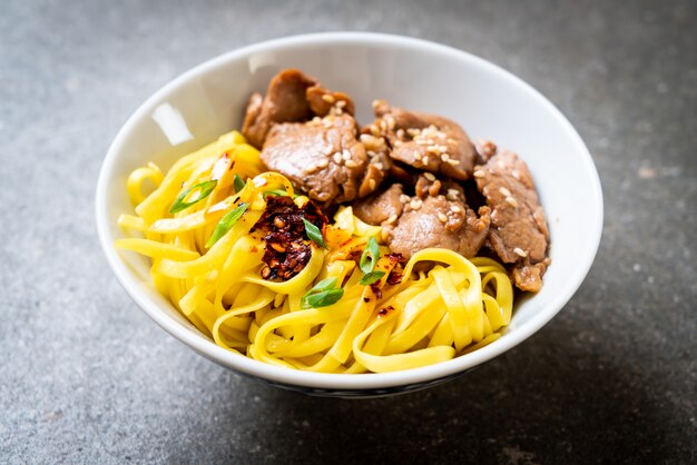 Asian stir-fried noodle with pork