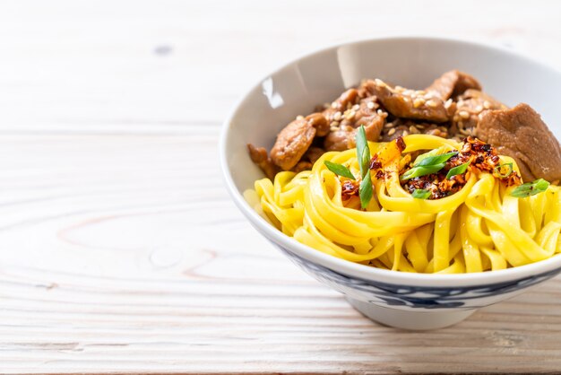 Asian stir-fried noodle with pork