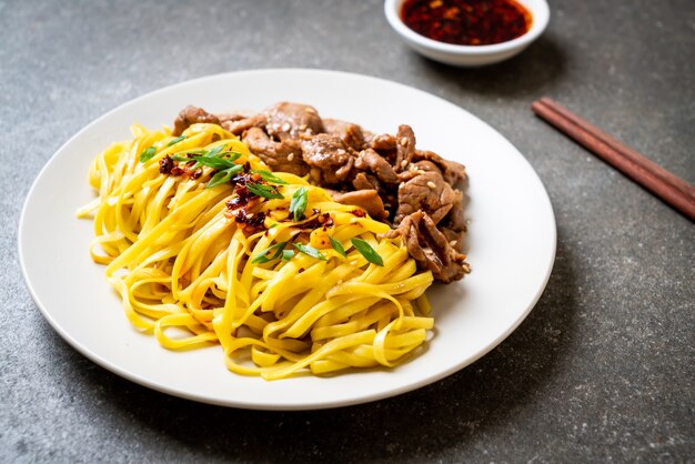 Asian stir-fried noodle with pork